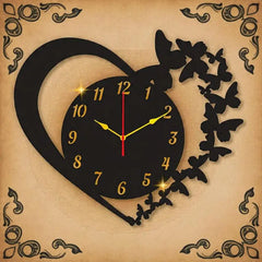 Decorative wall clock with heart and butterfly design on a beige background