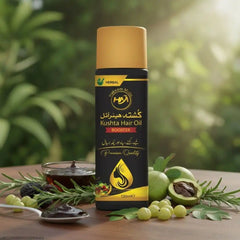 Kushta Hair Oil bottle with natural ingredients on a wooden surface