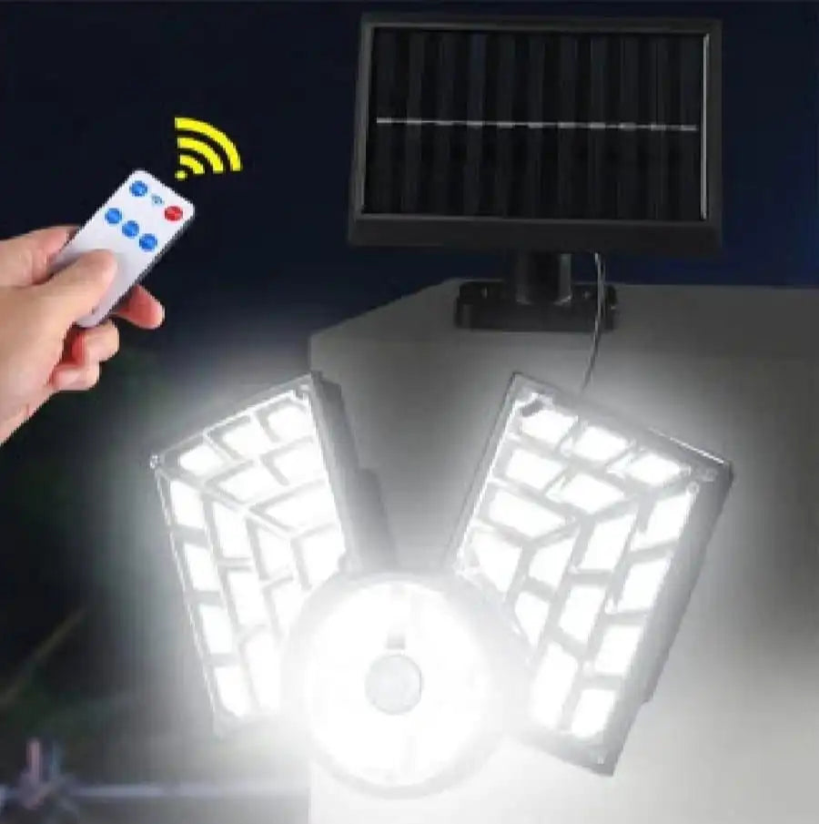 Solar-powered outdoor lights with remote control on a dark background