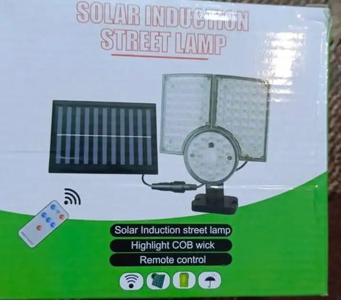 Box of a solar induction street lamp with solar panel and remote control illustration.