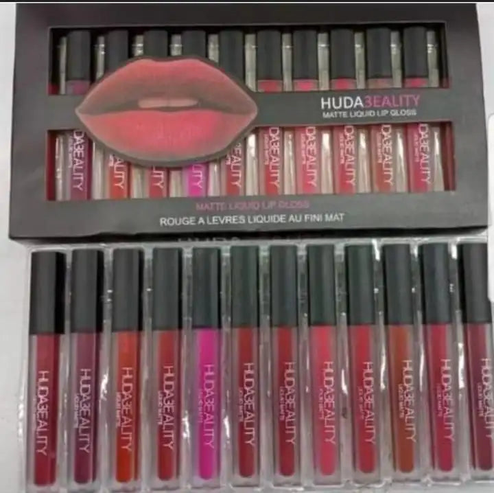 Set of Huda Beauty lip glosses with packaging displaying product images. Online product seller in Pakistan